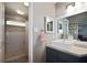 Stylish bathroom with a modern vanity, vessel sink, and updated shower with glass doors at 4034 Paddlewheel Dr, Brandon, FL 33511