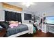 Cozy bedroom with wooden floors, and unique personal touches at 4034 Paddlewheel Dr, Brandon, FL 33511