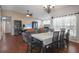 Bright dining area featuring a classic chandelier and large table perfect for Gathering gatherings at 4034 Paddlewheel Dr, Brandon, FL 33511