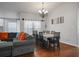Bright dining area featuring a classic chandelier and large table perfect for Gathering gatherings at 4034 Paddlewheel Dr, Brandon, FL 33511