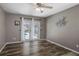 Versatile room with wood floors, French doors to backyard pool at 4034 Paddlewheel Dr, Brandon, FL 33511