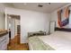 Bedroom featuring wood floors, a bed, and a view of another room at 4334 18Th N St, St Petersburg, FL 33714