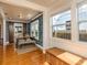 Elegant dining room featuring hardwood floors, stylish wallpaper, and ample natural light at 4334 18Th N St, St Petersburg, FL 33714