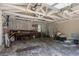 This is an image of a cluttered garage, offering ample space for storage or a workshop at 4334 18Th N St, St Petersburg, FL 33714