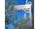 Artistic Harris Park sign against a blue sky surrounded by trees in a quiet neighborhood setting at 4334 18Th N St, St Petersburg, FL 33714