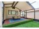 The screened porch features an outdoor dining area for entertaining at 4334 18Th N St, St Petersburg, FL 33714