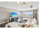 Inviting living room with modern decor, large windows showcasing bay views and an open layout at 4725 Cove Cir # 604, St Petersburg, FL 33708