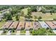 An aerial shot of residences in a community bordering a green golf course at 5429 Legend Hills Ln, Spring Hill, FL 34609