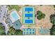Overhead view of community pool, playground, tennis courts, pickleball courts and basketball court at 5429 Legend Hills Ln, Spring Hill, FL 34609