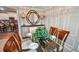 Tastefully decorated dining room featuring a glass top table with seating for six at 5457 Leslie Canyon Dr, Wimauma, FL 33598