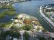 Aerial view highlighting waterfront property and lush foliage at 6 Sea S Ln, St Petersburg, FL 33705