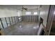 A bedroom undergoing renovations features exposed cinder blocks and concrete floors awaiting finishing touches at 6 Sea S Ln, St Petersburg, FL 33705