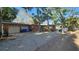 Charming home with a two-car garage and patterned driveway at 6 Sea S Ln, St Petersburg, FL 33705