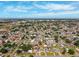 An overhead shot displays a well-planned community with neatly arranged homes and green spaces at 6010 Blossom Ave, Tampa, FL 33614