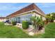 Well-manicured backyard showing lush green grass and beautiful landscaping at 623 Park Cir # 623, Bradenton, FL 34207