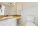 Bathroom featuring vanity area, a mirror, tiled floor, and a bathtub-shower combination at 623 Park Cir # 623, Bradenton, FL 34207