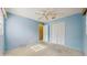 Bedroom with closet, window, and ceiling fan at 623 Park Cir # 623, Bradenton, FL 34207