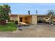 Charming single-story home with a covered carport and well-maintained landscaping at 623 Park Cir # 623, Bradenton, FL 34207