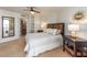 Main bedroom featuring carpet and access to ensuite bathroom at 690 Island Way # 1011, Clearwater Beach, FL 33767