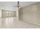 Bright dining area with tile flooring, chandelier and ample natural light from the large windows at 9155 125Th St, Seminole, FL 33772