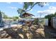 Backyard with a bar, pool and shed at 920 16Th Sw Ave, Largo, FL 33770
