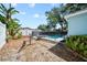 Backyard with landscaping and a pool at 920 16Th Sw Ave, Largo, FL 33770
