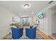 Open-concept living room with modern furnishings, a mounted TV, and ample natural light at 920 16Th Sw Ave, Largo, FL 33770