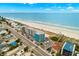Aerial view of the beachfront property and beach access, close to local shopping and dining at 9980 Gulf Blvd # 603, Treasure Island, FL 33706