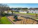 Community playground and pool area providing lots of space for activities at 10226 Purple Leaf Ct, Riverview, FL 33578