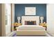 Inviting bedroom with a plush bed, tasteful decor, and ample natural light at 10282 Purple Leaf Ct, Riverview, FL 33578