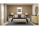 Well-decorated bedroom featuring a comfortable bed, bedside tables, and modern decor at 10282 Purple Leaf Ct, Riverview, FL 33578