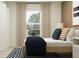 Comfortable bedroom with soft lighting, neutral tones, and a view of the outdoors at 10282 Purple Leaf Ct, Riverview, FL 33578