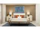 Comfortable bedroom featuring stylish decor, bedside lamps, and cozy accents at 10282 Purple Leaf Ct, Riverview, FL 33578