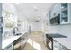 Modern kitchen featuring stainless steel appliances, quartz countertops, and blue cabinets at 1045 22Nd N Ave, St Petersburg, FL 33704