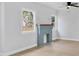 Bright and airy living room featuring a decorative blue brick fireplace and ample natural light at 1045 22Nd N Ave, St Petersburg, FL 33704
