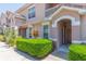 Attractive condo featuring well-maintained landscaping and an inviting entrance at 10473 Villa View Cir, Tampa, FL 33647