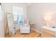 Cozy seating nook in a bedroom, creating a peaceful retreat at 10473 Villa View Cir, Tampa, FL 33647