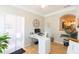 Inviting home office with ample light, providing a practical workspace with a relaxed atmosphere at 10473 Villa View Cir, Tampa, FL 33647