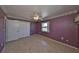 Bedroom featuring tile floor, ceiling fan and closet at 1207 Norwich Cir, Sun City Center, FL 33573