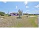View of the home's front yard at 1207 Norwich Cir, Sun City Center, FL 33573