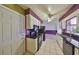 Bright kitchen with granite countertops and modern appliances at 1207 Norwich Cir, Sun City Center, FL 33573