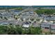 Aerial view of a neighborhood with community lakes at 12150 Ledbury Commons Dr, Gibsonton, FL 33534