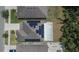 Aerial view of the home featuring solar panels and a carport at 12150 Ledbury Commons Dr, Gibsonton, FL 33534