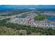Aerial view of the community featuring ponds and lush surroundings at 12150 Ledbury Commons Dr, Gibsonton, FL 33534