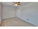 Bedroom with neutral walls, carpet, ceiling fan, and closet with bi-fold doors at 12150 Ledbury Commons Dr, Gibsonton, FL 33534