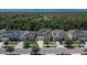 Beautiful two-story home with a well-manicured lawn and three-car garage at 12150 Ledbury Commons Dr, Gibsonton, FL 33534
