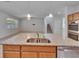 Granite kitchen island with stainless steel appliances, great for cooking and entertaining Gathering and friends at 12150 Ledbury Commons Dr, Gibsonton, FL 33534