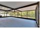 Large screened-in patio area with ceiling fans at 12150 Ledbury Commons Dr, Gibsonton, FL 33534