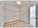 Spacious walk-in closet with carpeted floors at 12150 Ledbury Commons Dr, Gibsonton, FL 33534