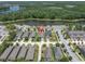 Aerial view of a home located on a spacious lot with lake view in Starkey Ranch at 12462 Rangeland Blvd, Odessa, FL 33556